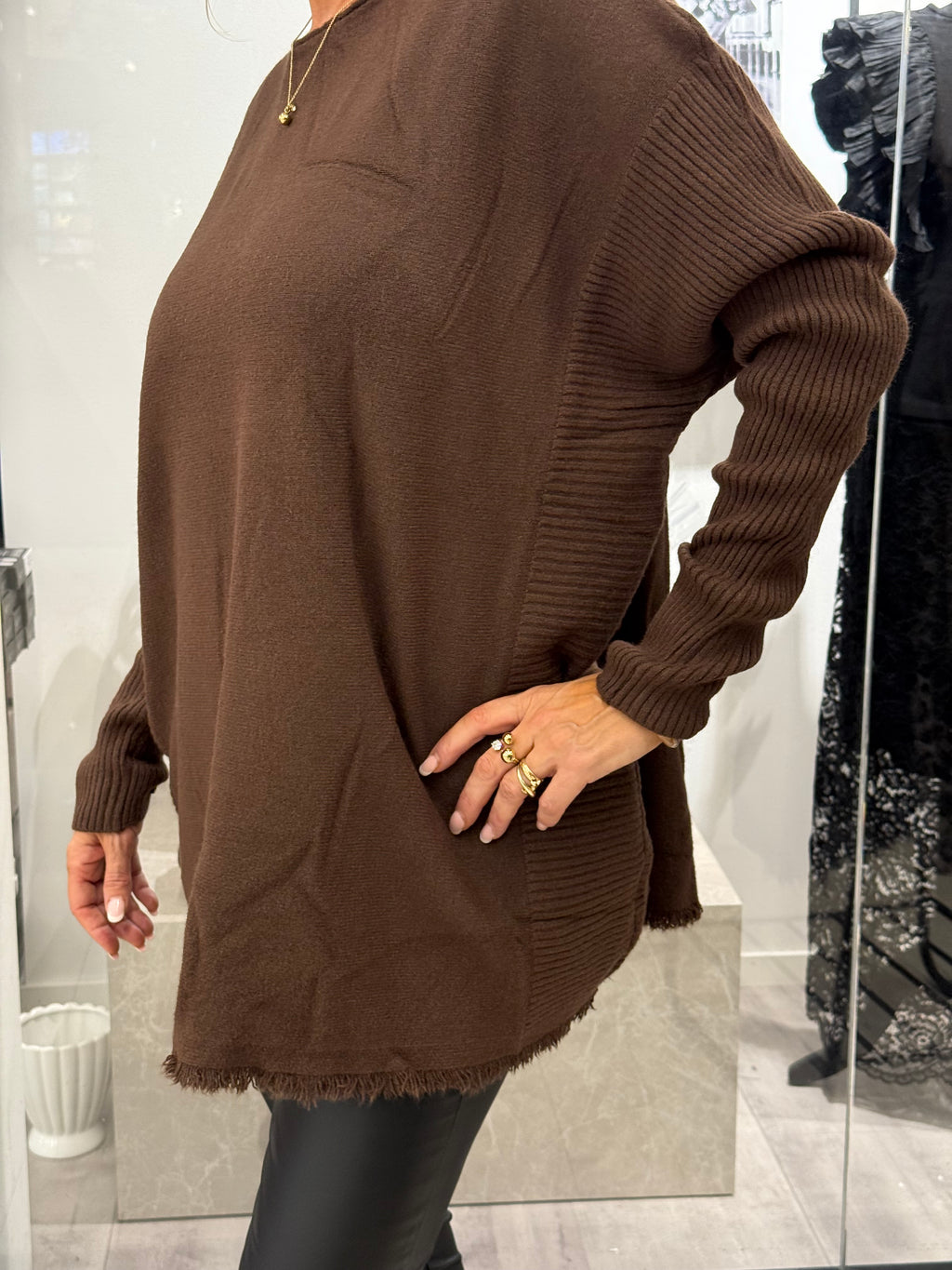 Brown sweater with long ribbed sleeves