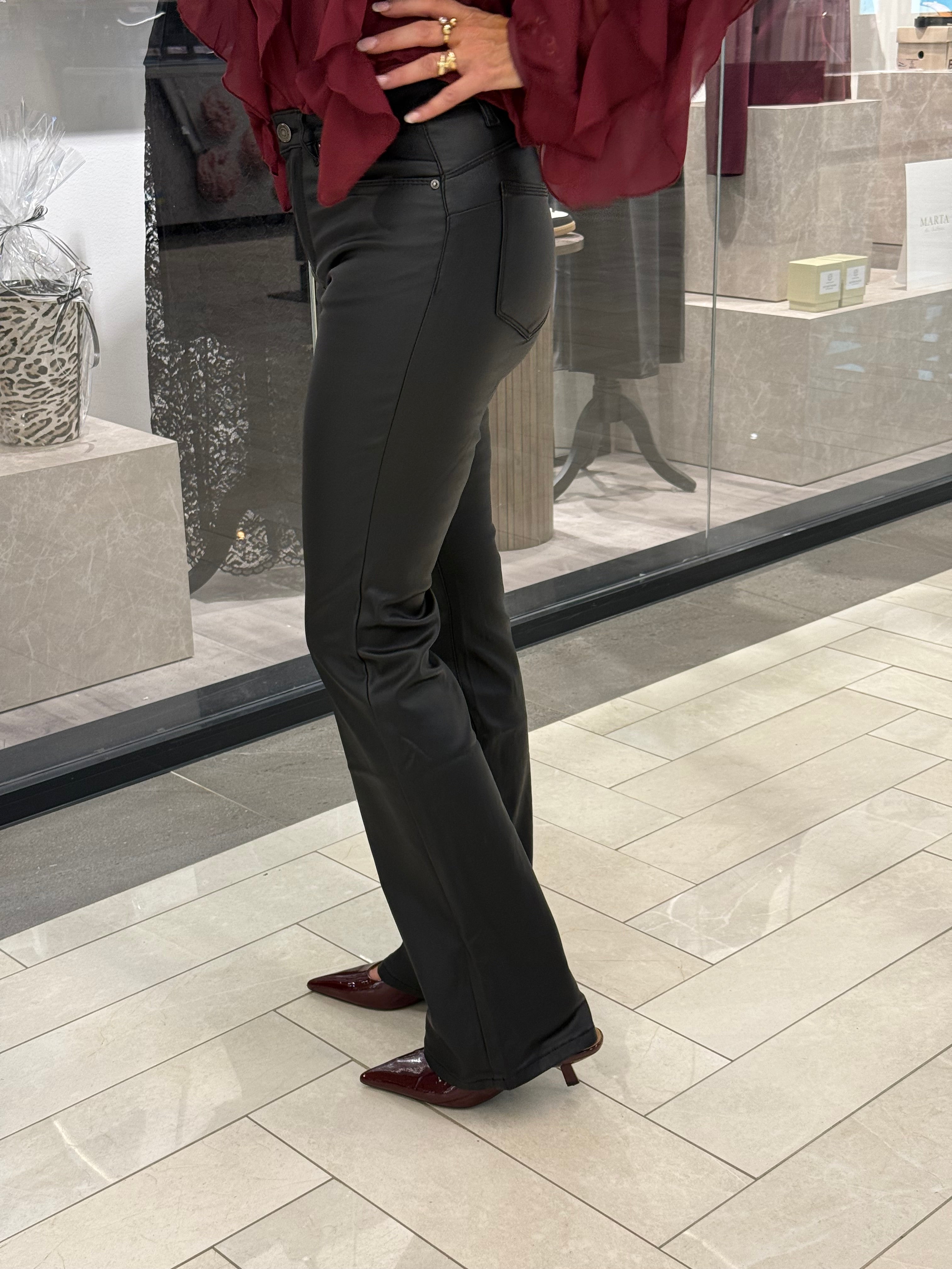 Toxik faux leather bootcut pants, black.