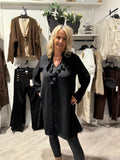 Tunic with ruffle details, black