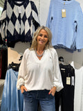 V ringad blus vit