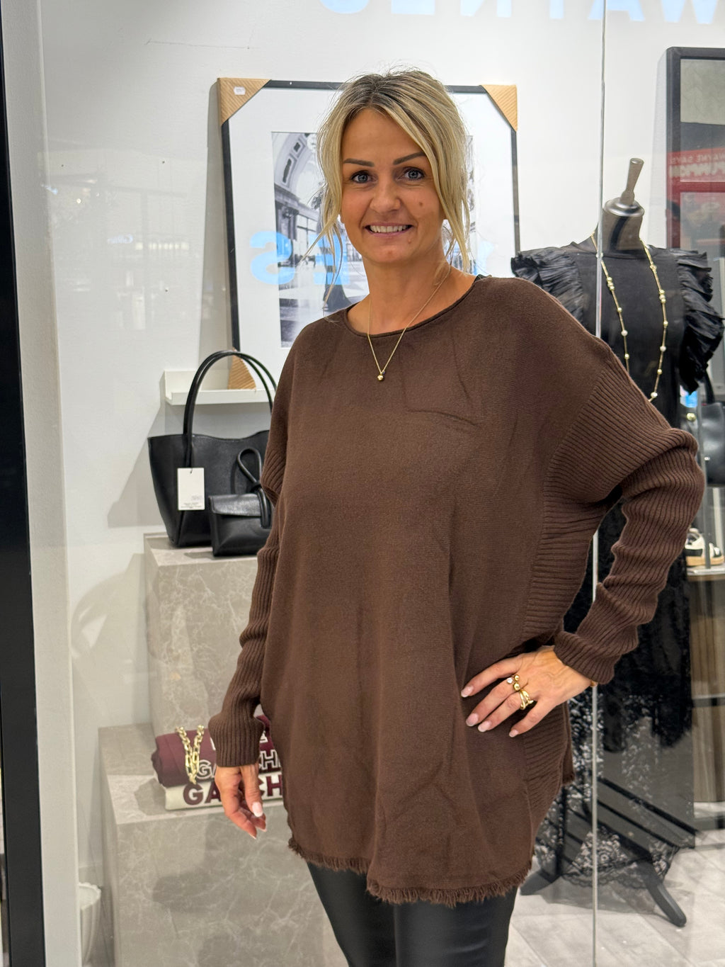 Brown sweater with long ribbed sleeves