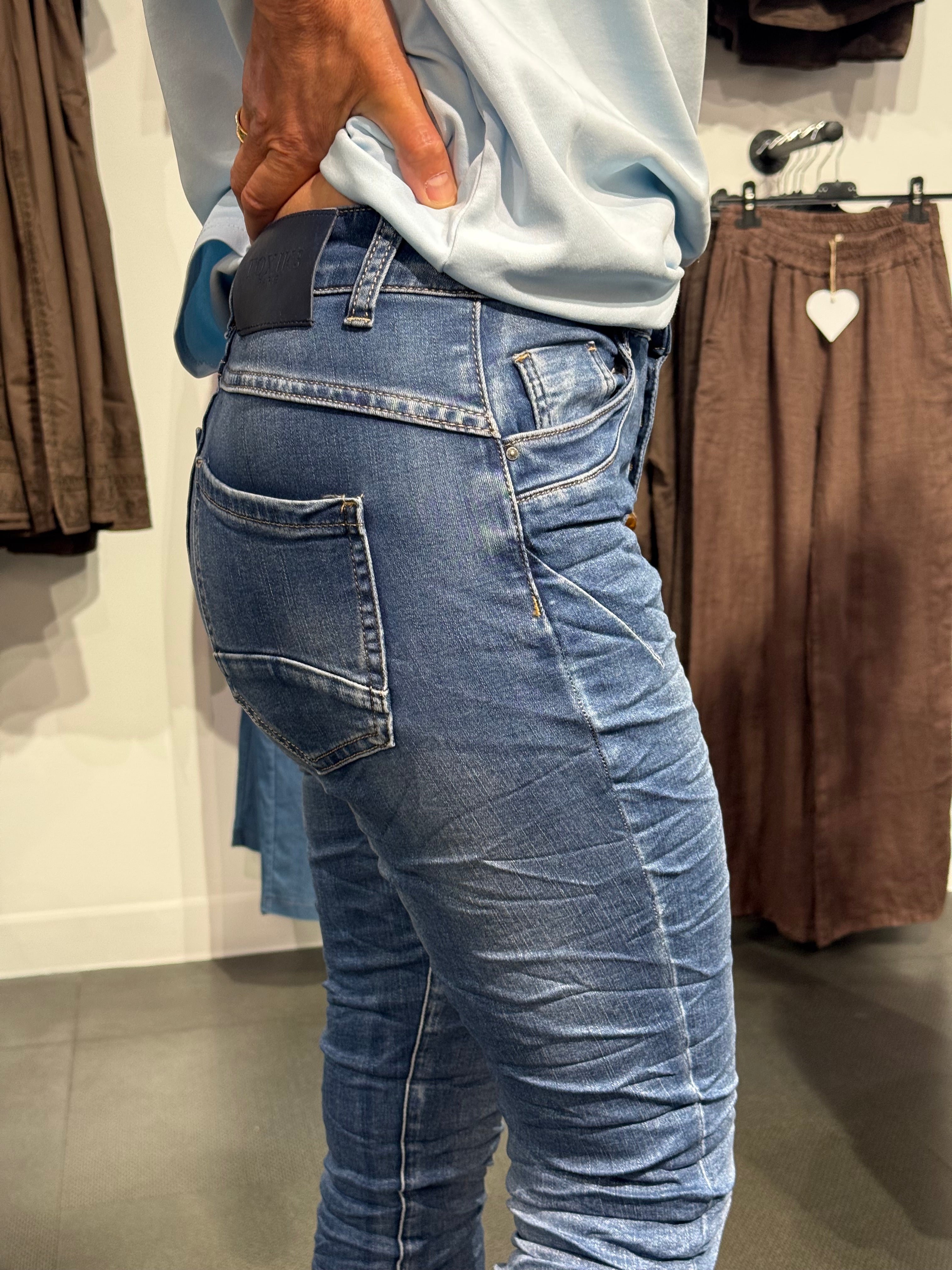 Mirakeljeans- knappar