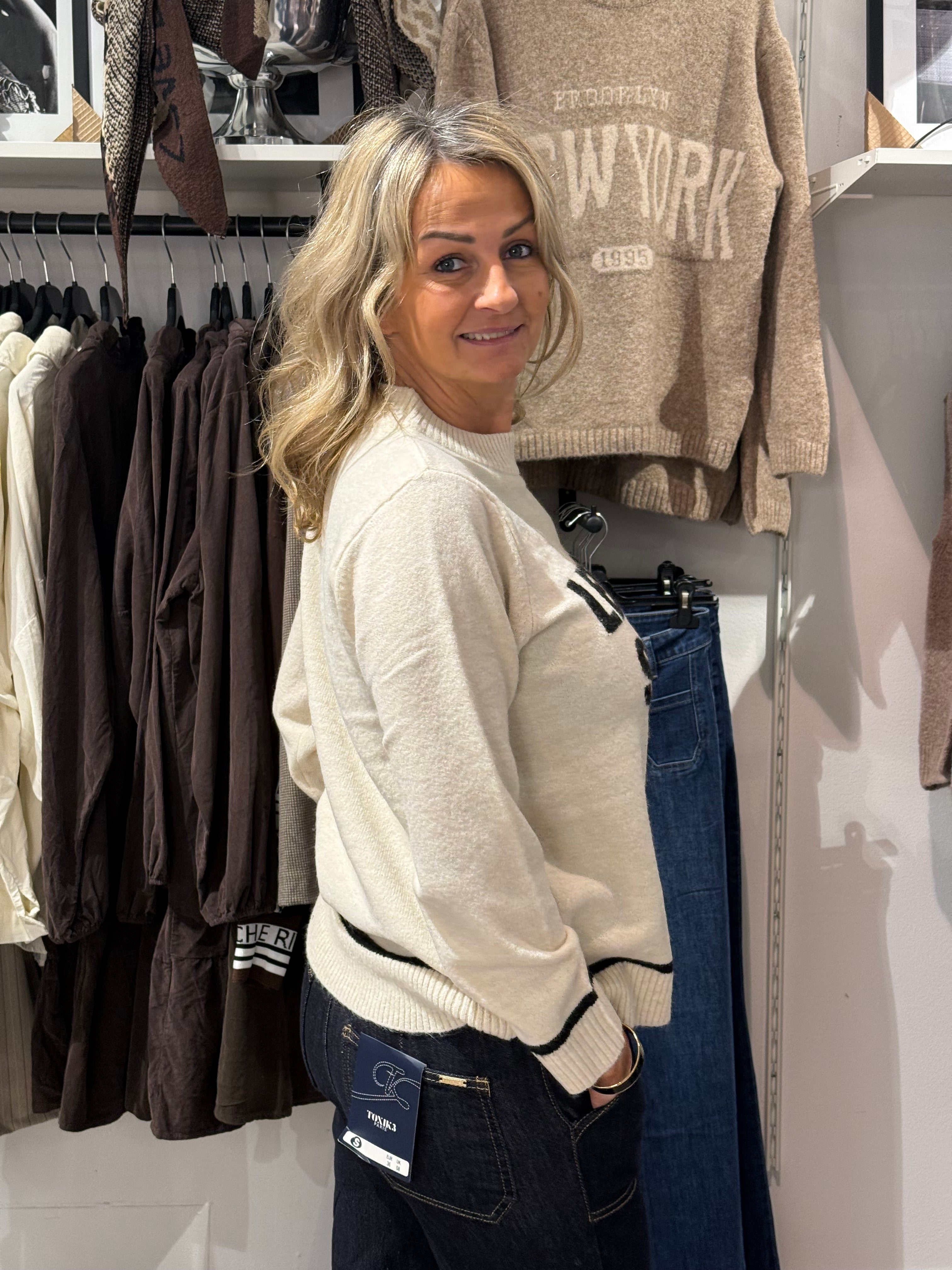 League spirit- stickad tröja beige/svart