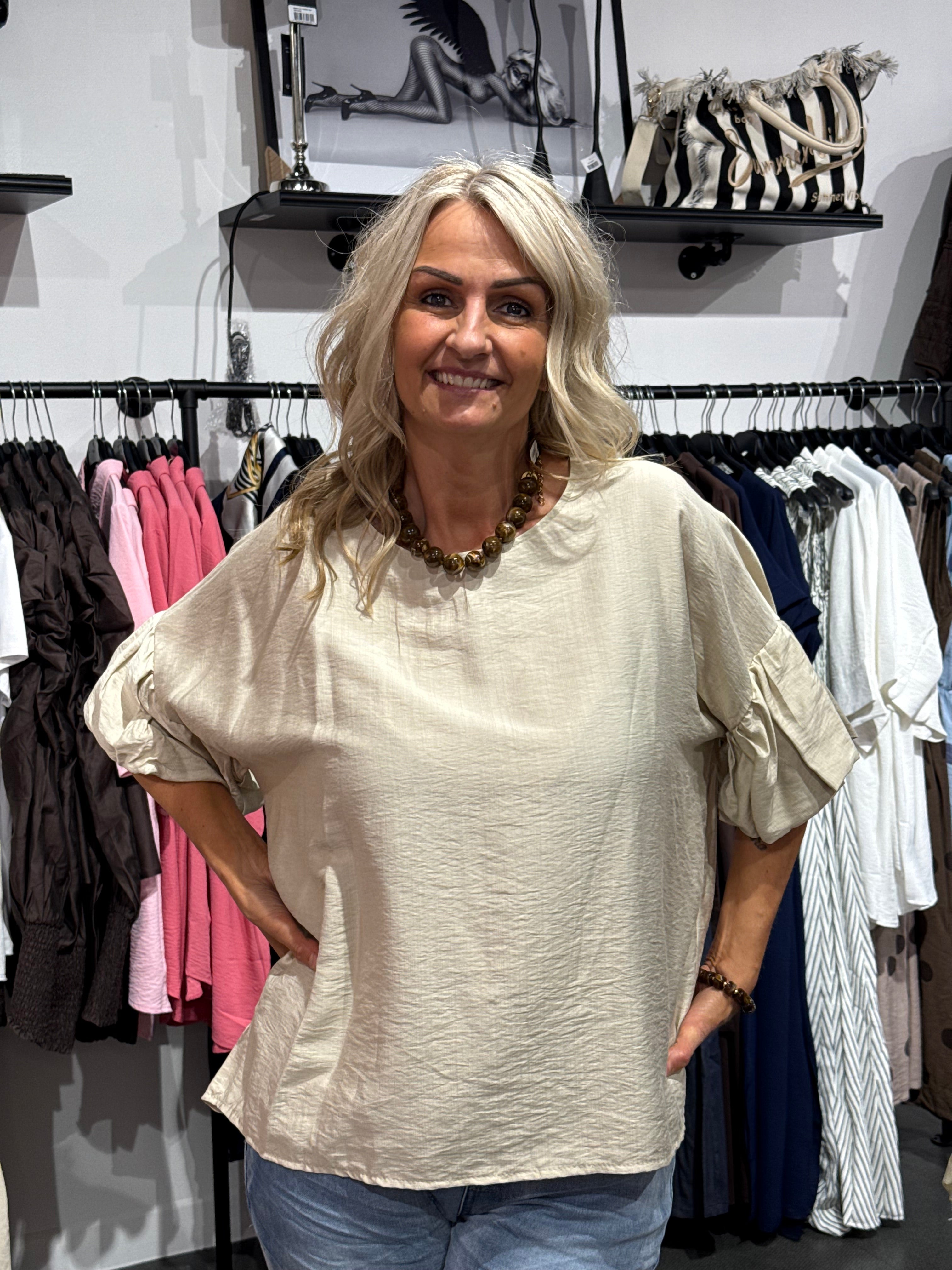 Topp med puffärmar- beige