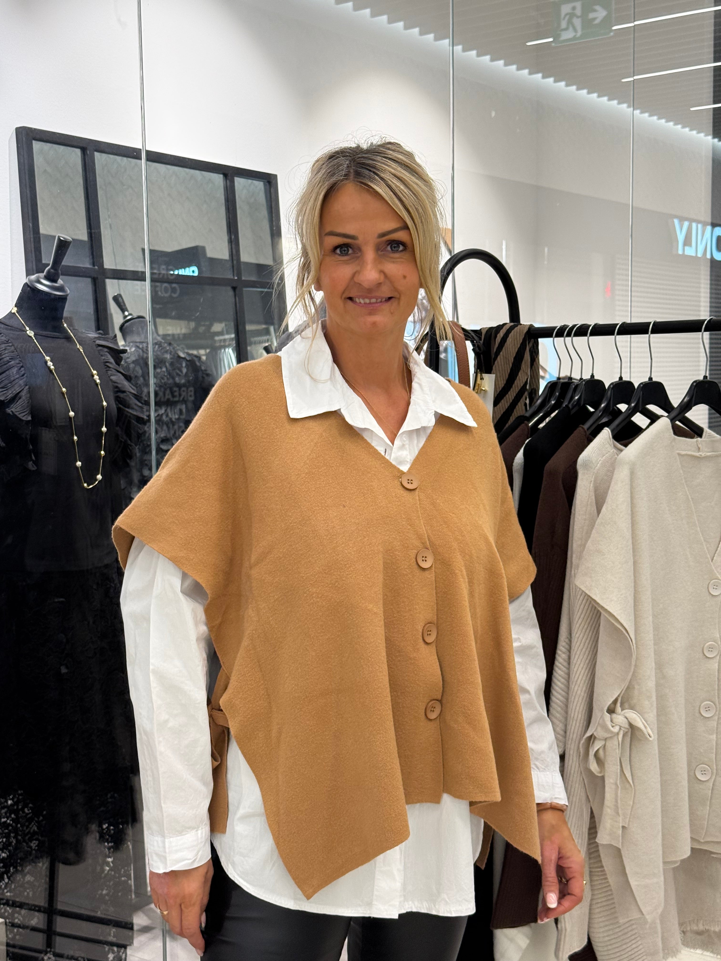 Camel-colored vest with tie detail