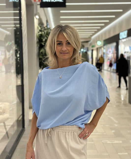 Off shoulder topp ljusblå