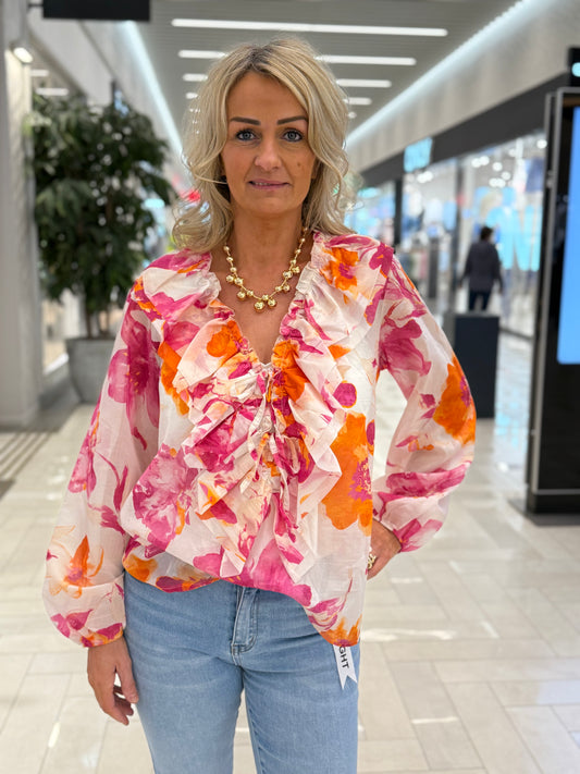 Mönstrad blus rosa/orange