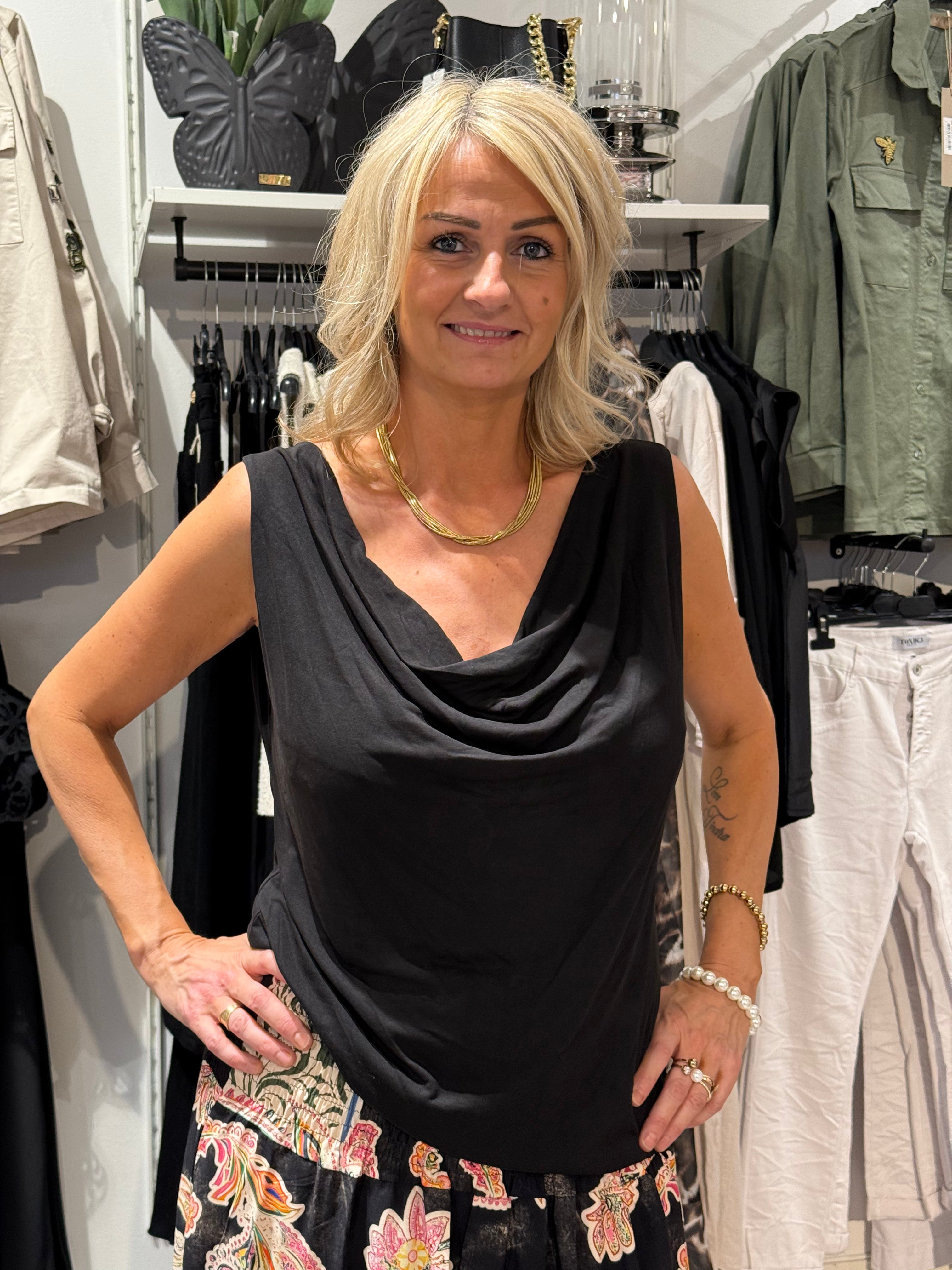 Draperat linne svart