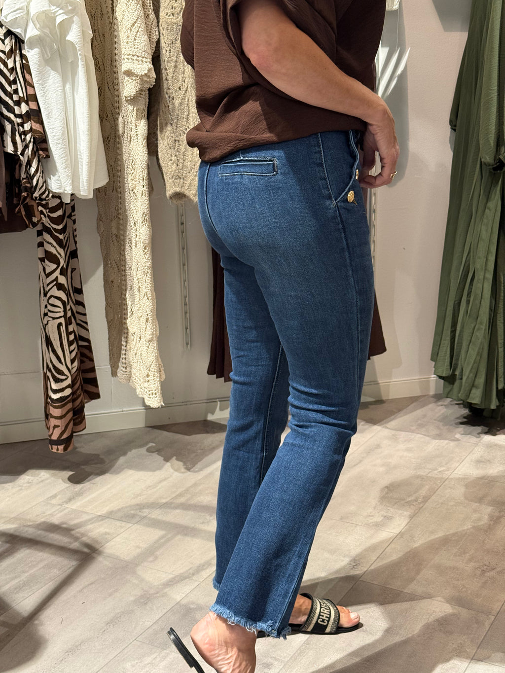 Flared jeans med guldknappar blå